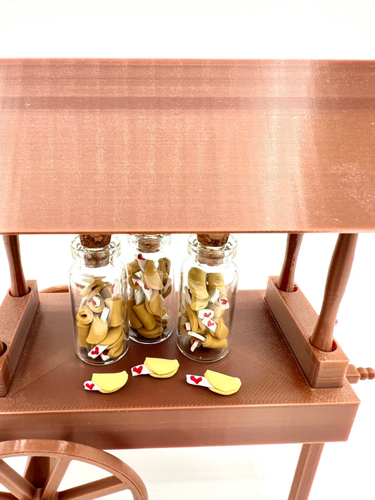 Miniature bottle of handmade fortune cookies